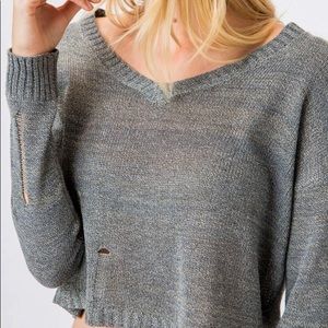 Distressed cropped sweater